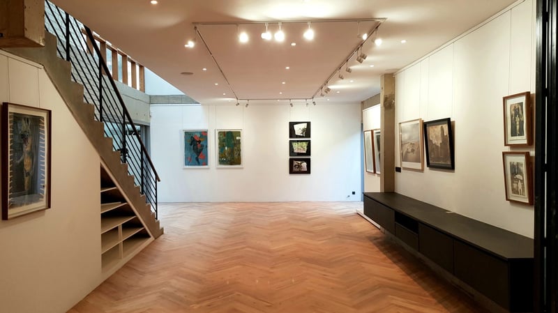 Guns and Rain gallery evening view